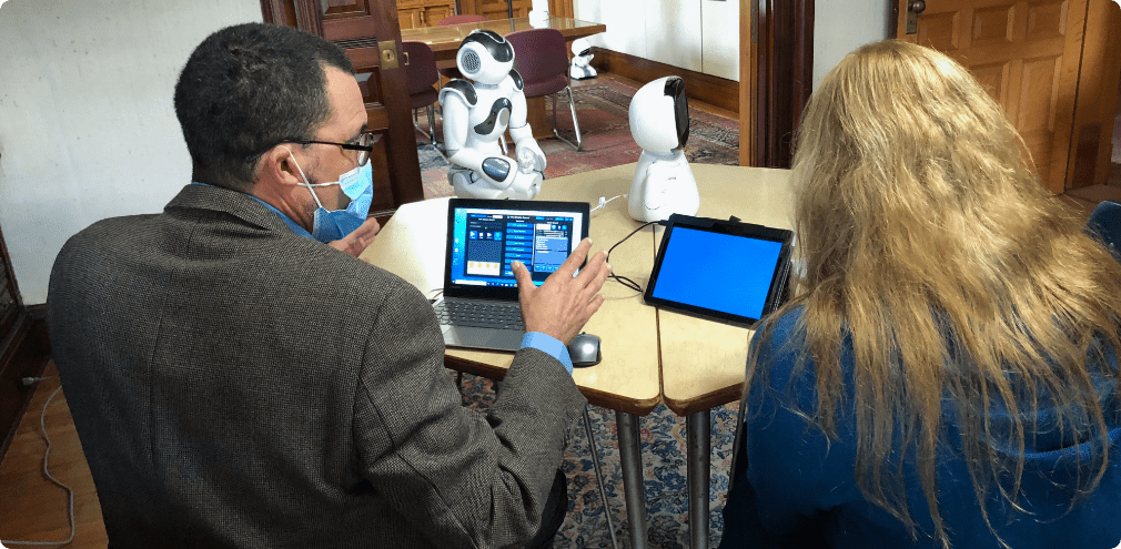 Tim Gifford with Kebbi and NAO robots Tim Gifford with Kebbi and NAO robots